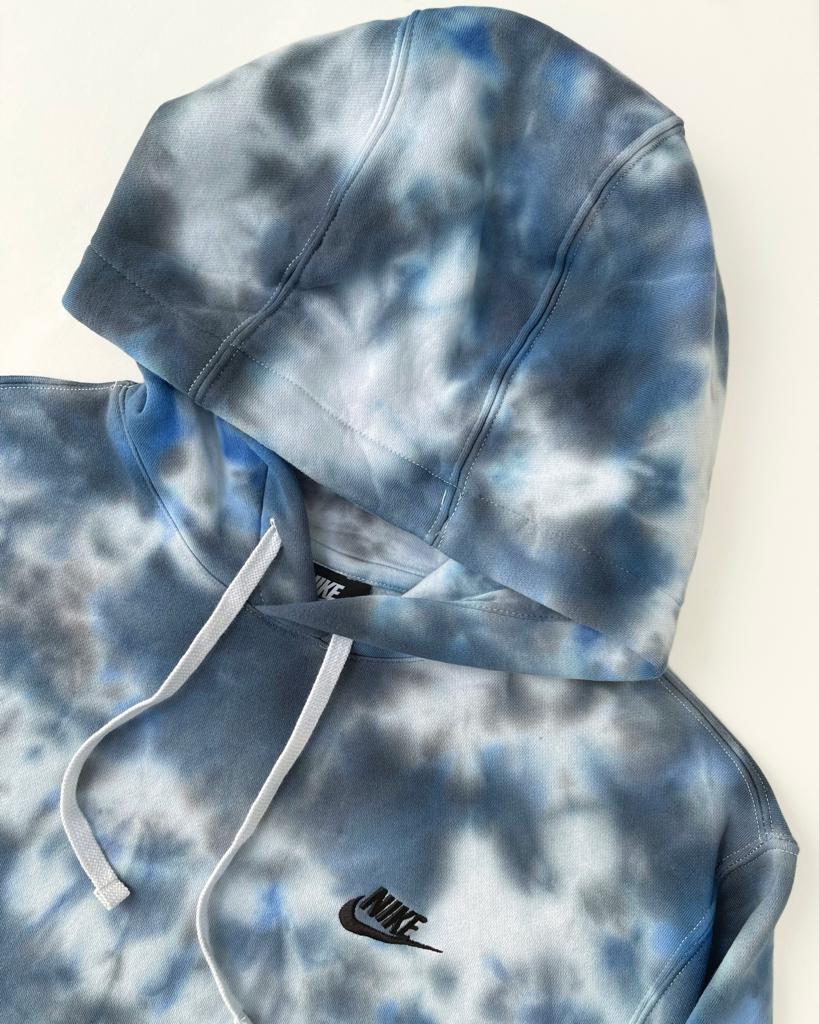 Vibrant Space Blue tie-dye design on a comfortable Nike hoodie.