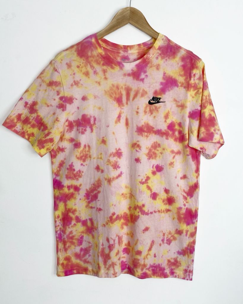 Nike tie-dye t-shirt pink yellow orange with black embroidered logo. Fruit Punch Colour Trip collection.