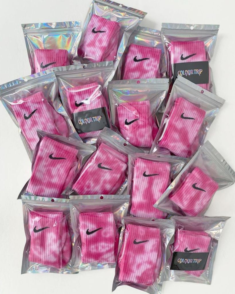 Pink tie dye Nike socks ready to ship.