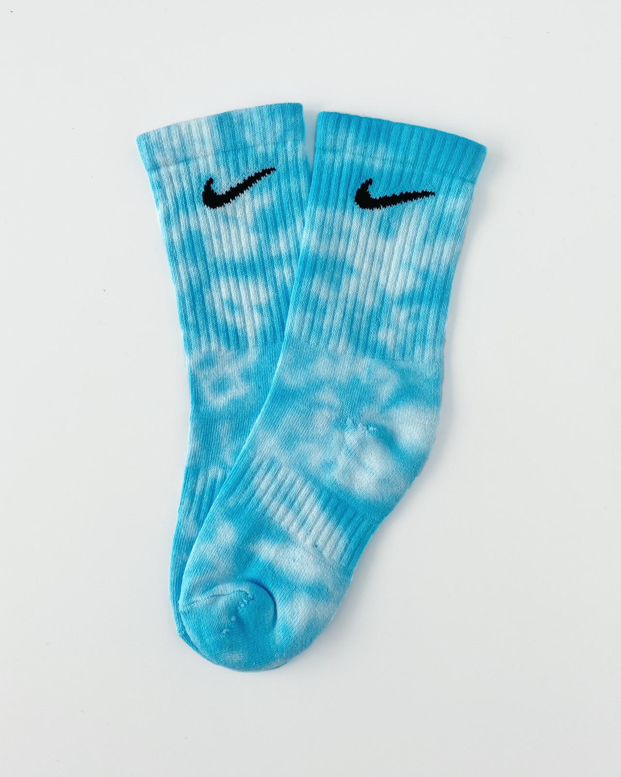Colorful and authentic Sky tie dye Nike socks made with high-quality dye.