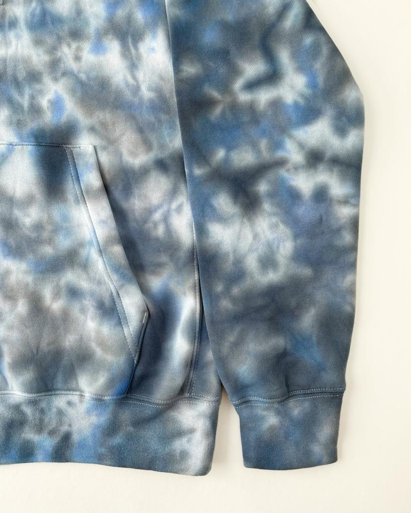 Cosmic blue shades on a hand-dyed, unique Nike tie-dye hoodie