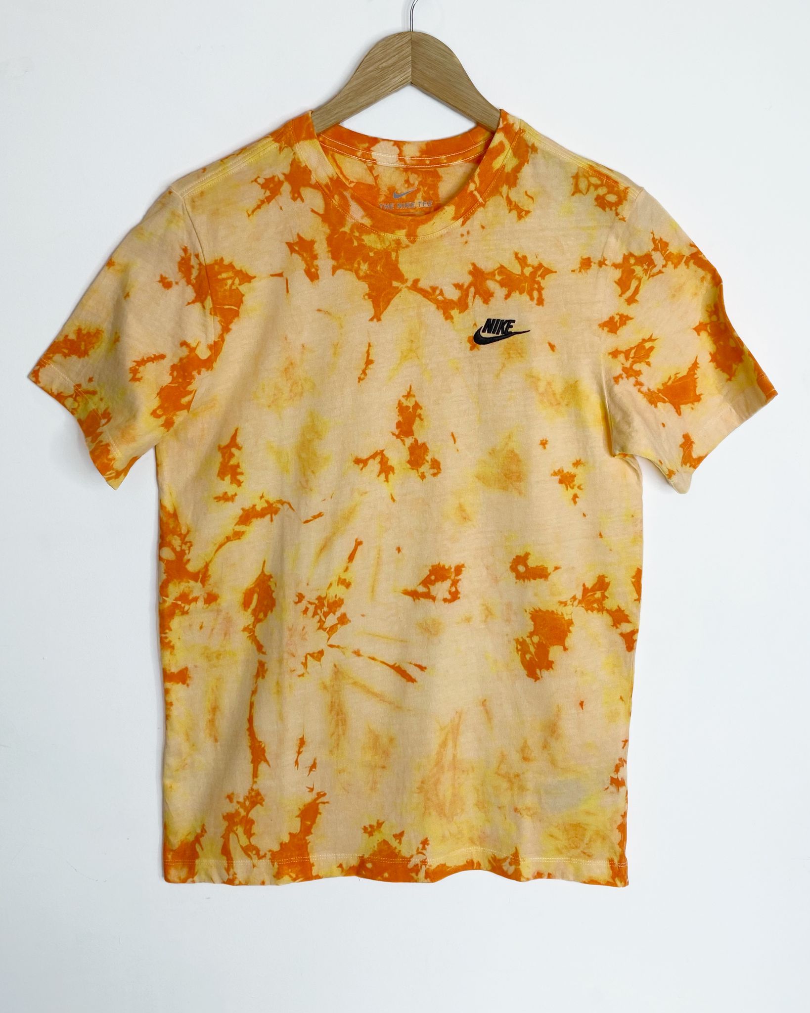Unique hand-dyed Fanta mix colors tie dye on a classic Nike t-shirt.
