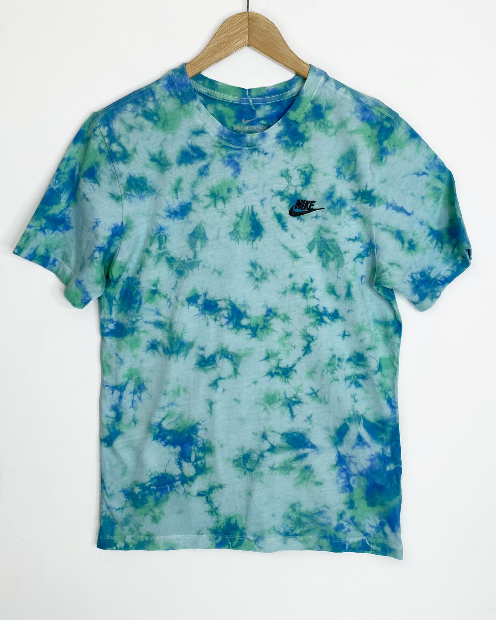 Colorful and unique Tulip tie dye pattern on 100% authentic Nike tee.